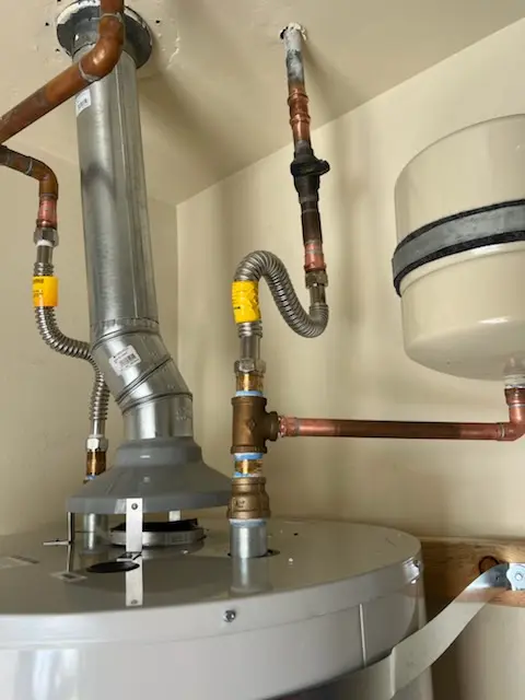 Water heater installation and plumbing repair in Adrian